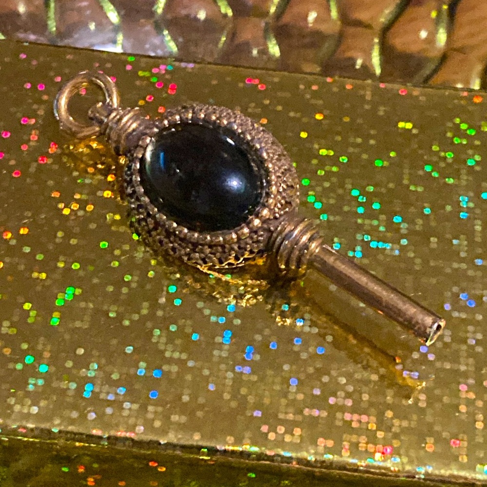 Jeanne signed  pocket watch key brooch. EVC